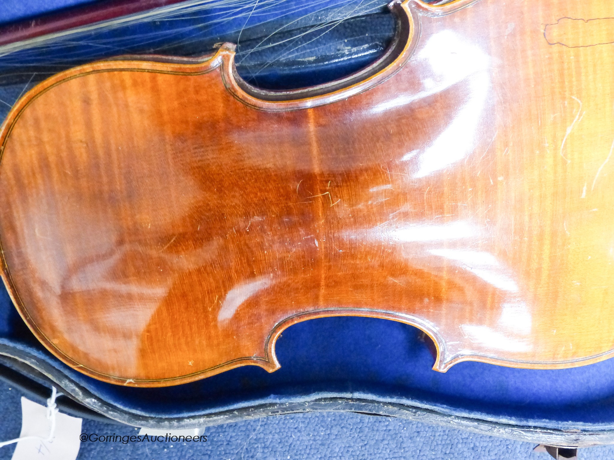 A student violin in case